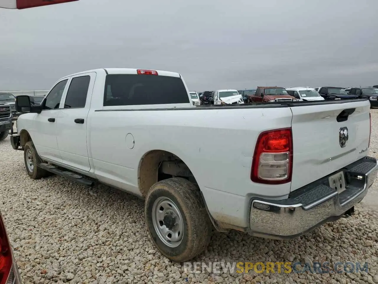 2 Photograph of a damaged car 3C6UR5HJ7RG139575 RAM 2500 2024