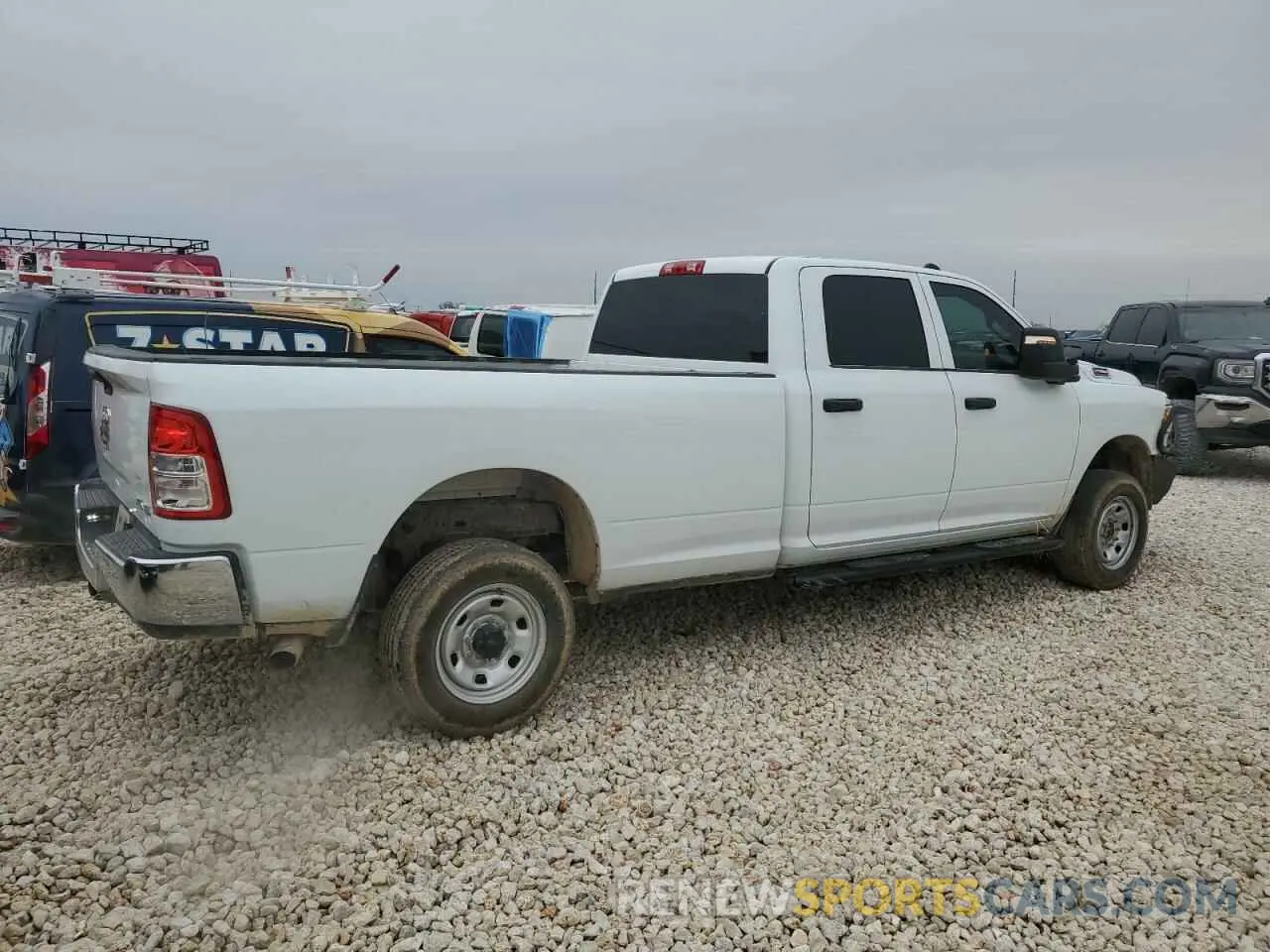 3 Photograph of a damaged car 3C6UR5HJ7RG139575 RAM 2500 2024