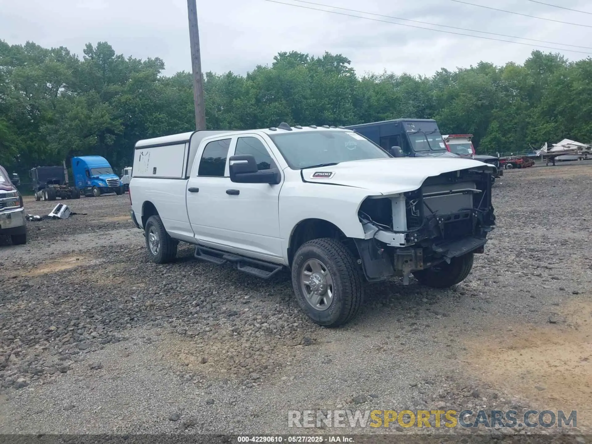 1 Photograph of a damaged car 3C6UR5HJ8RG288173 RAM 2500 2024