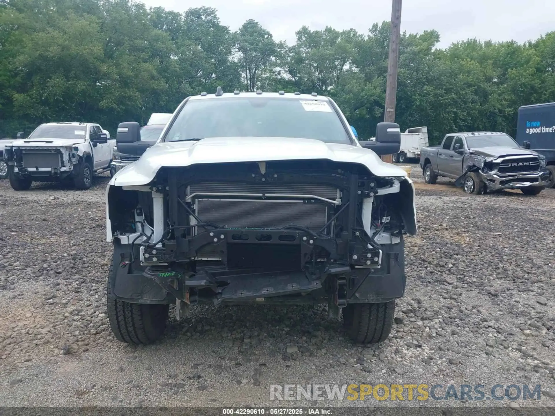 13 Photograph of a damaged car 3C6UR5HJ8RG288173 RAM 2500 2024