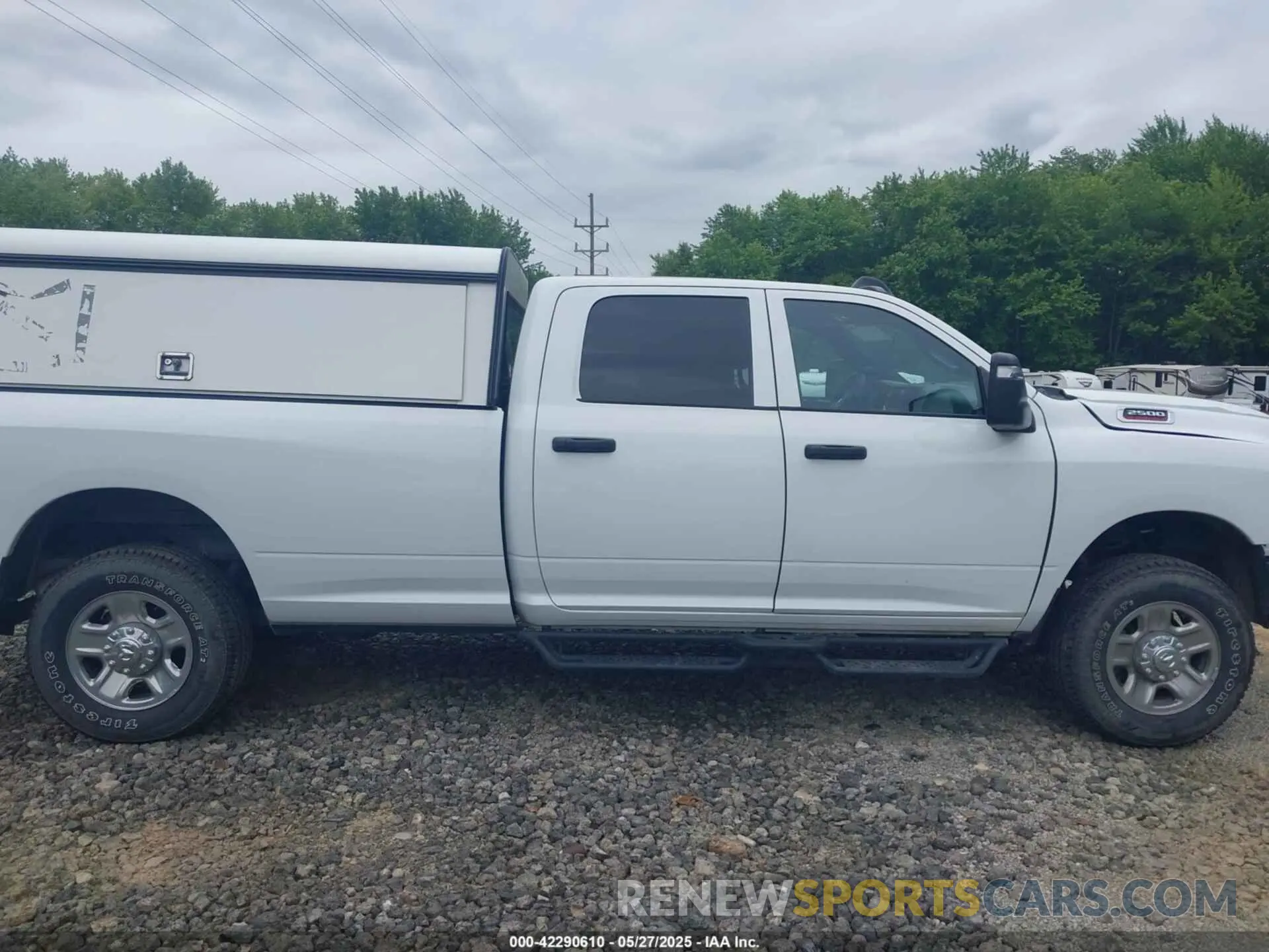 14 Photograph of a damaged car 3C6UR5HJ8RG288173 RAM 2500 2024