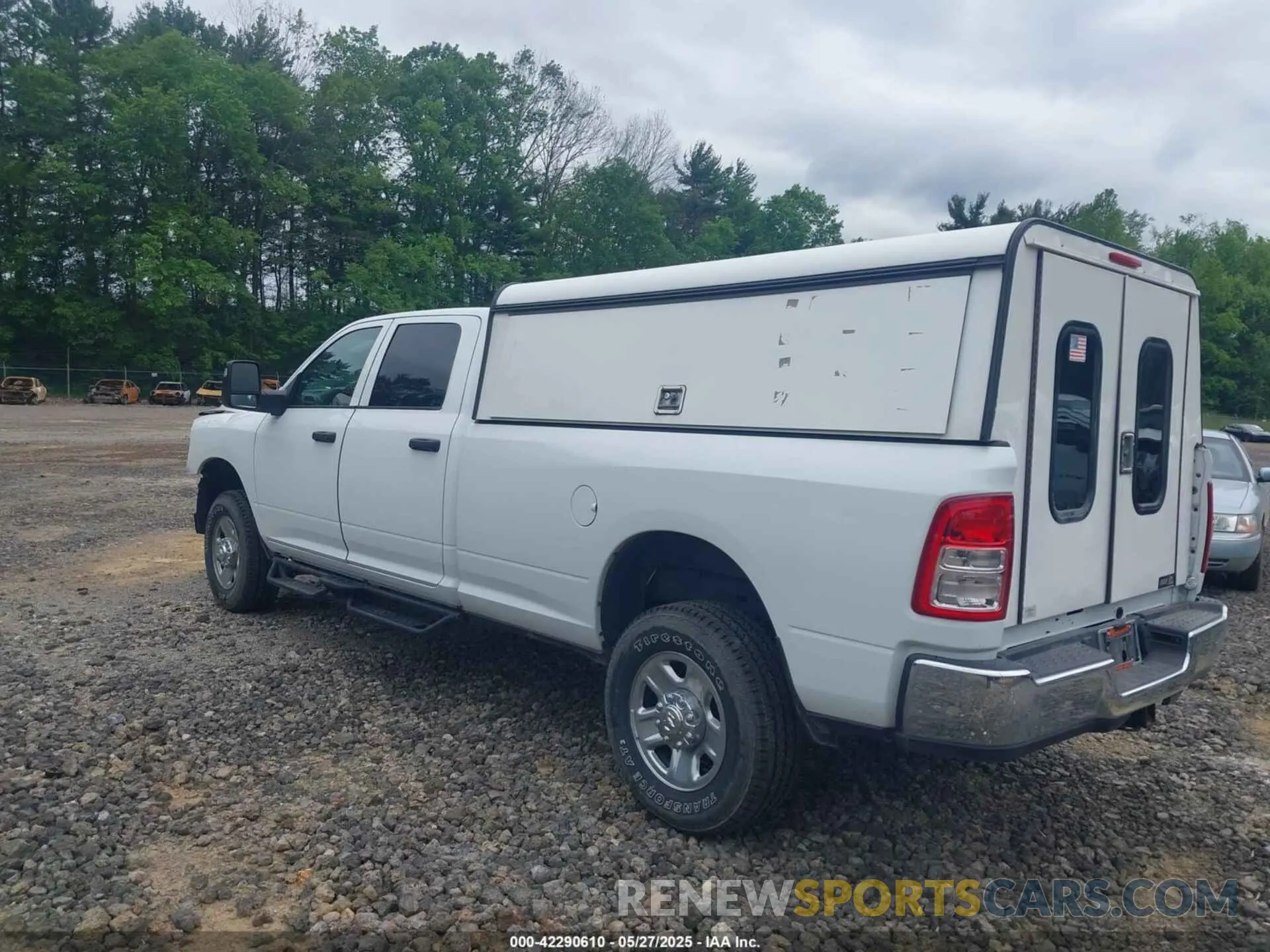 3 Photograph of a damaged car 3C6UR5HJ8RG288173 RAM 2500 2024