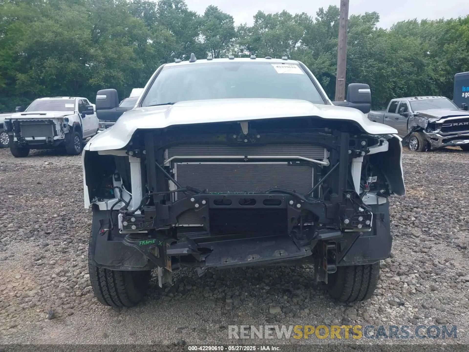6 Photograph of a damaged car 3C6UR5HJ8RG288173 RAM 2500 2024