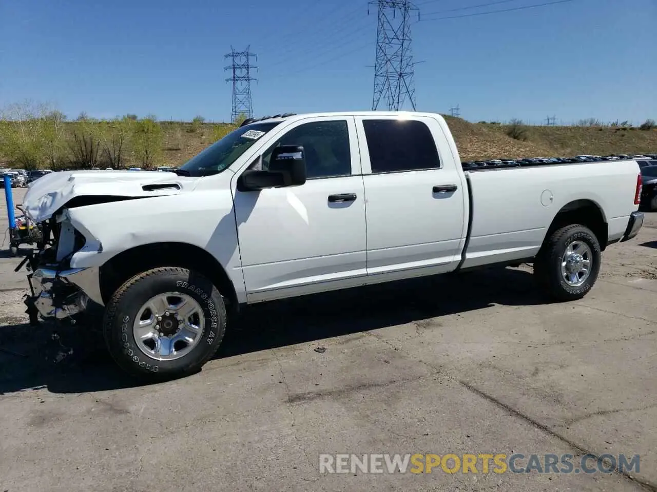 1 Photograph of a damaged car 3C6UR5HJ9RG162386 RAM 2500 2024