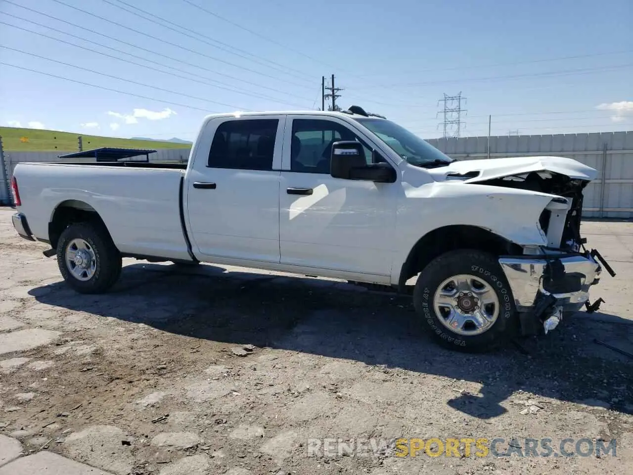 4 Photograph of a damaged car 3C6UR5HJ9RG162386 RAM 2500 2024