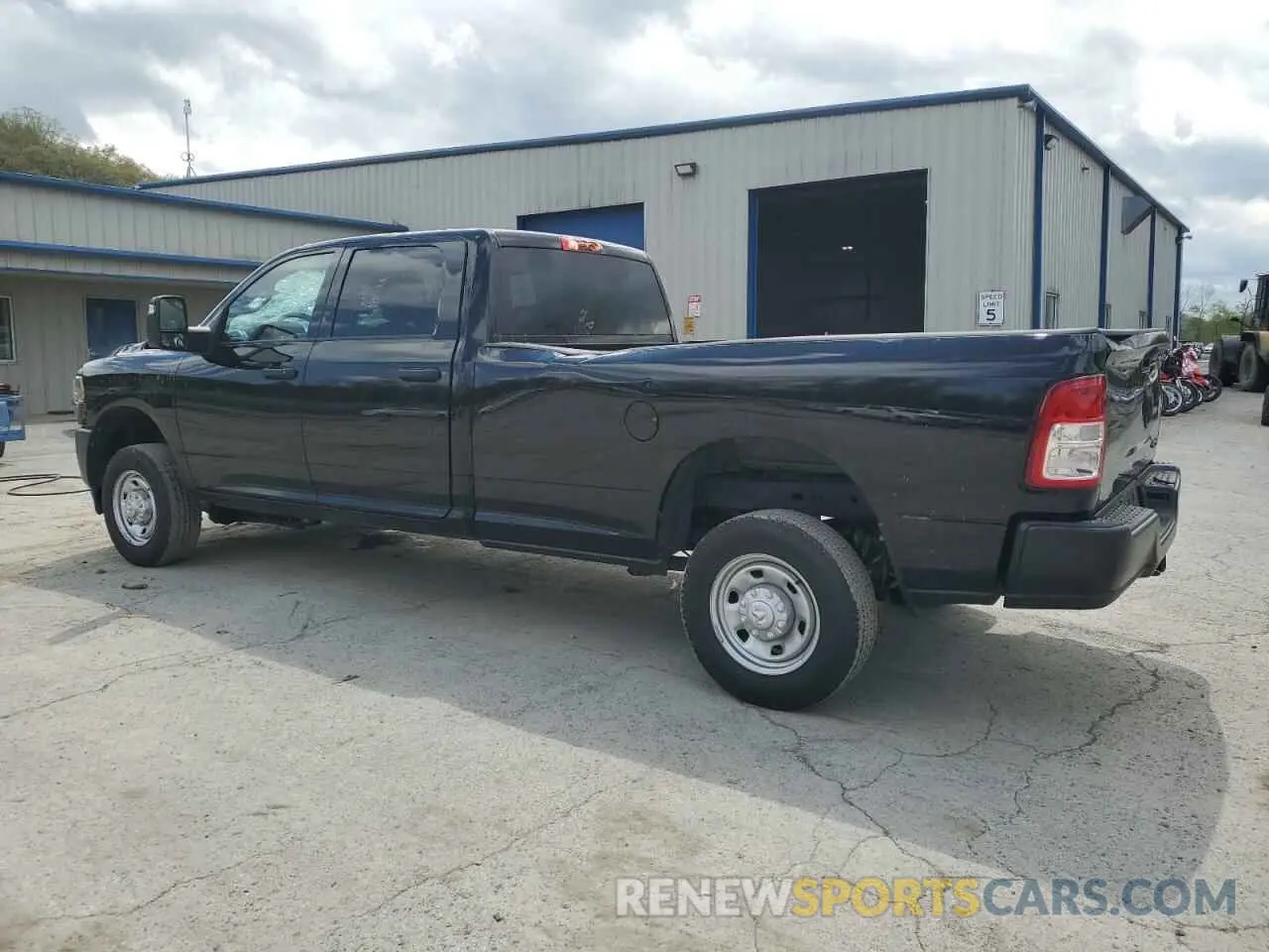 2 Photograph of a damaged car 3C6UR5HJ9RG376715 RAM 2500 2024