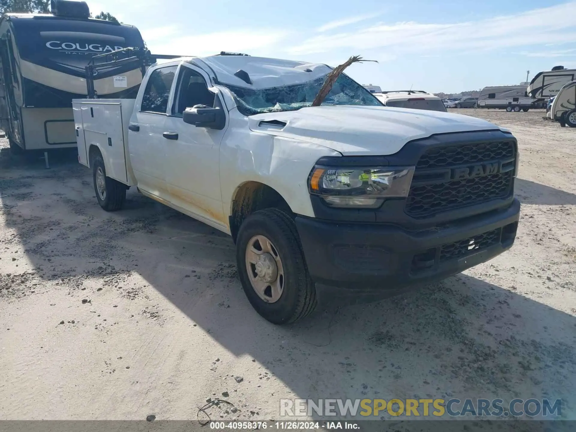 1 Photograph of a damaged car 3C6UR5HJXRG151946 RAM 2500 2024
