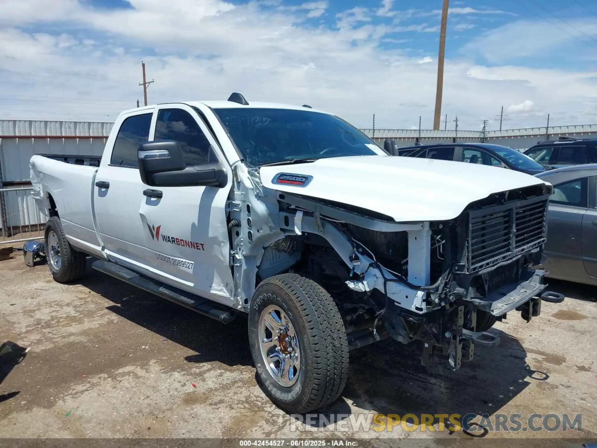 1 Photograph of a damaged car 3C6UR5HJXRG389635 RAM 2500 2024