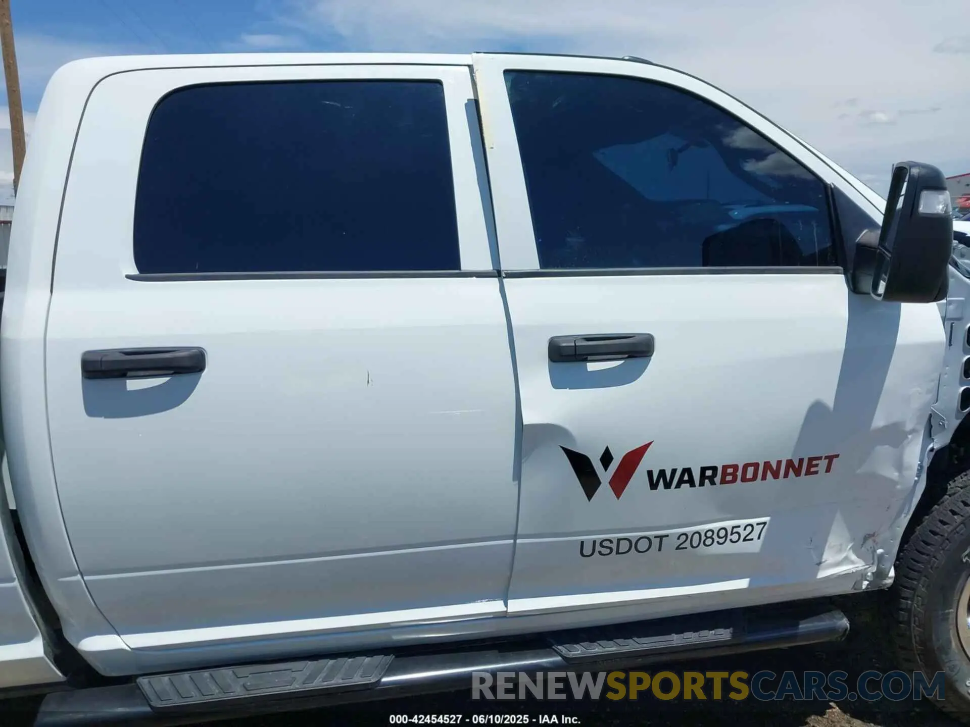 14 Photograph of a damaged car 3C6UR5HJXRG389635 RAM 2500 2024