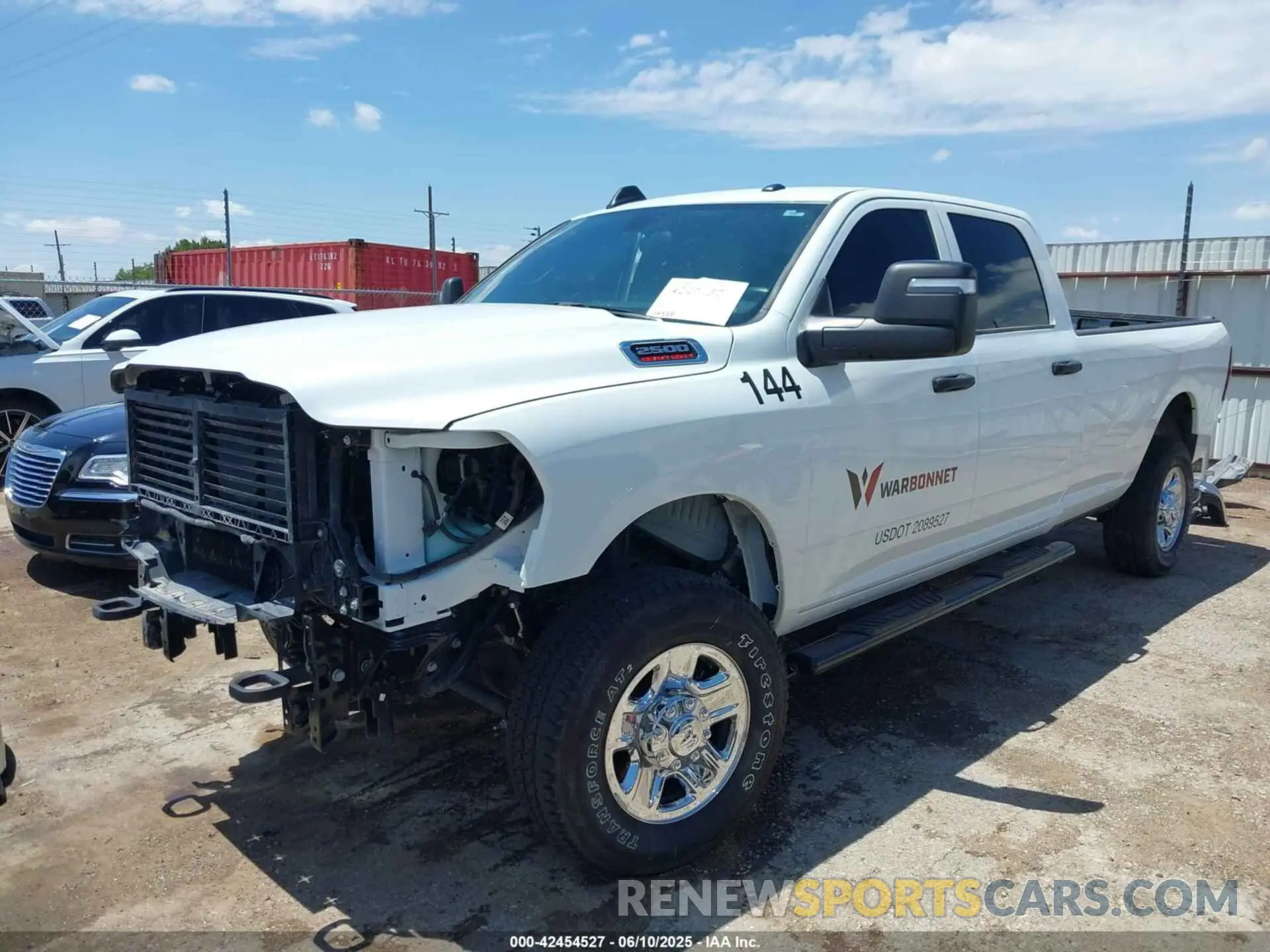2 Photograph of a damaged car 3C6UR5HJXRG389635 RAM 2500 2024