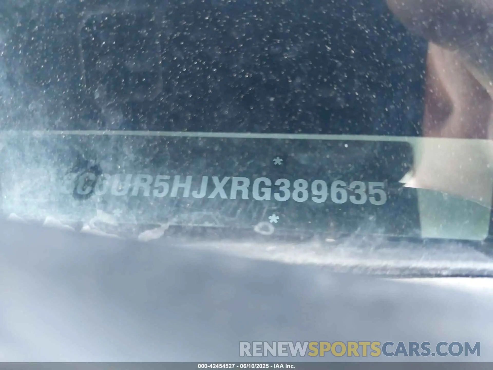 9 Photograph of a damaged car 3C6UR5HJXRG389635 RAM 2500 2024