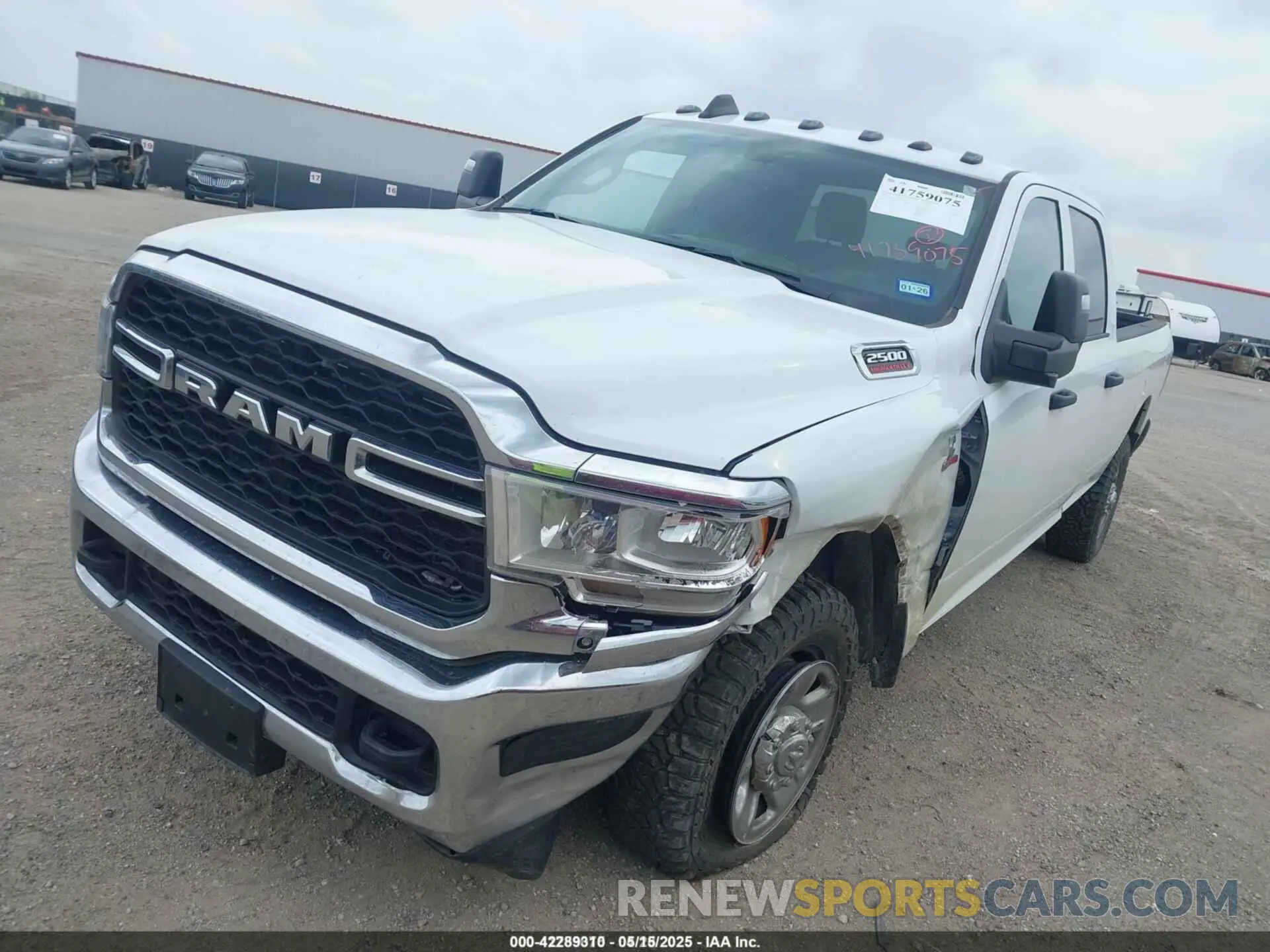 2 Photograph of a damaged car 3C6UR5HL0RG103115 RAM 2500 2024