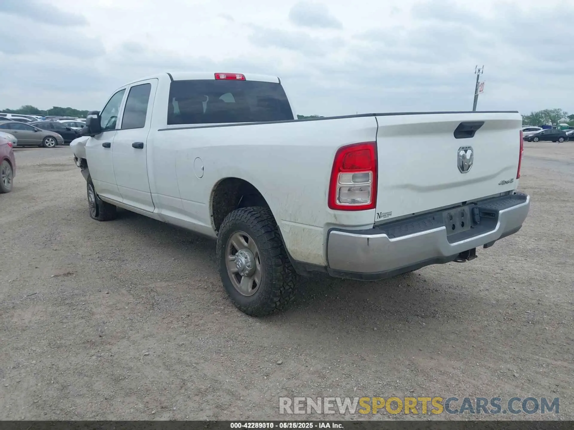 3 Photograph of a damaged car 3C6UR5HL0RG103115 RAM 2500 2024