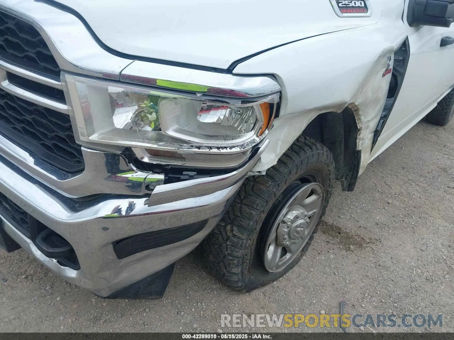 6 Photograph of a damaged car 3C6UR5HL0RG103115 RAM 2500 2024