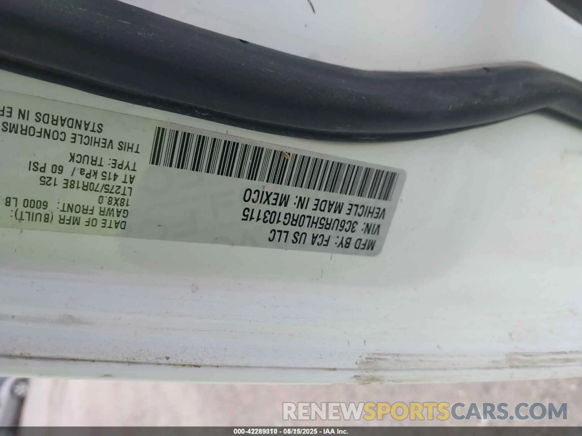 9 Photograph of a damaged car 3C6UR5HL0RG103115 RAM 2500 2024