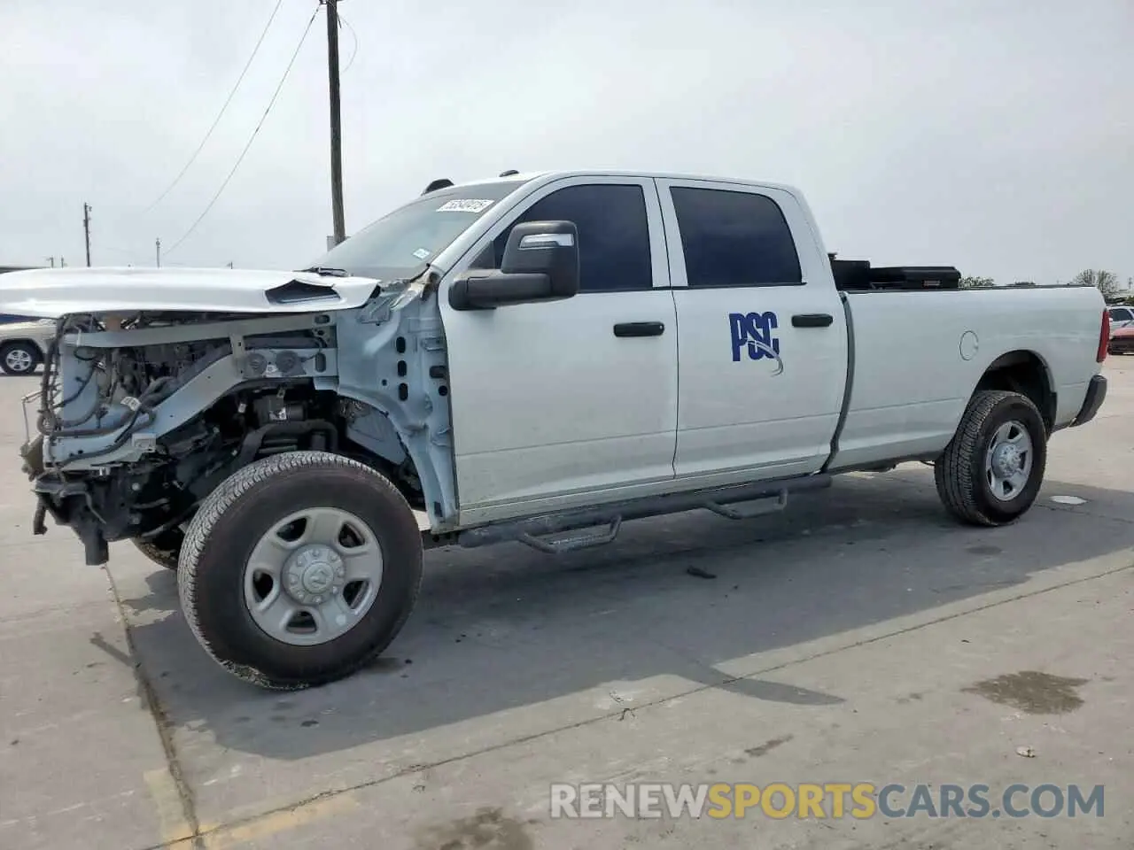 1 Photograph of a damaged car 3C6UR5HL1RG153408 RAM 2500 2024