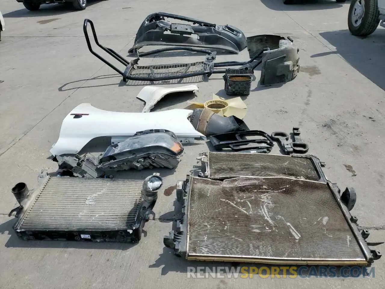12 Photograph of a damaged car 3C6UR5HL1RG153408 RAM 2500 2024
