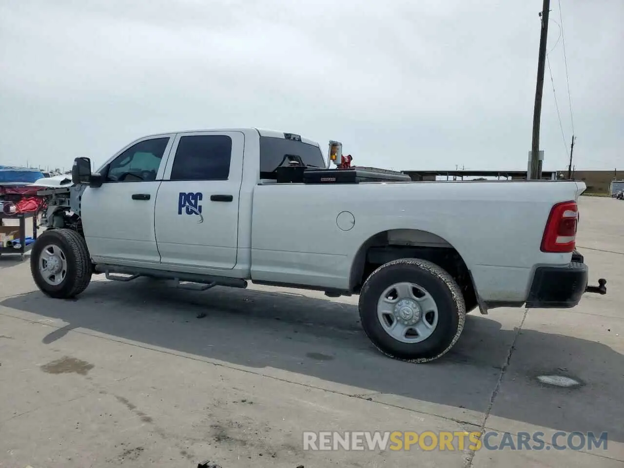2 Photograph of a damaged car 3C6UR5HL1RG153408 RAM 2500 2024