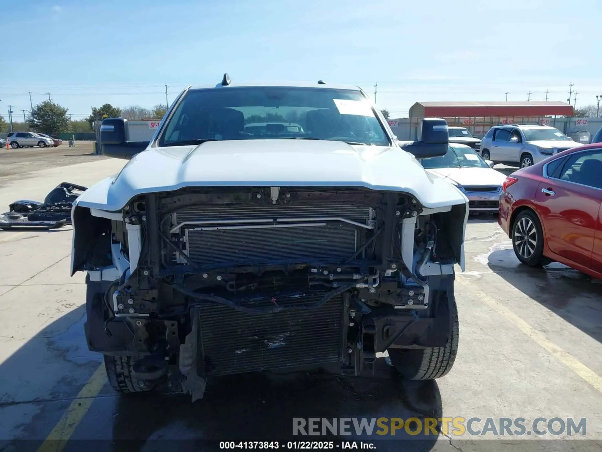 13 Photograph of a damaged car 3C6UR5HL3RG253266 RAM 2500 2024
