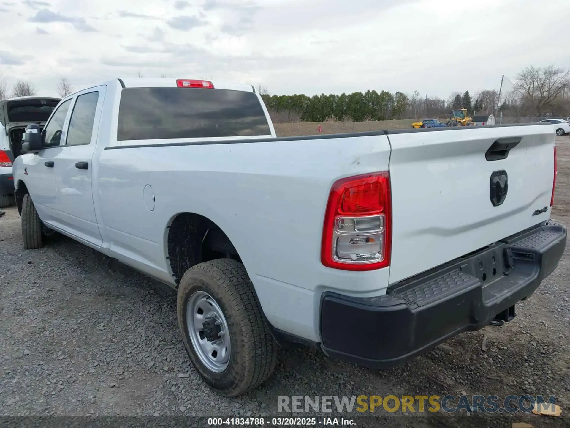 3 Photograph of a damaged car 3C6UR5HL4RG156559 RAM 2500 2024