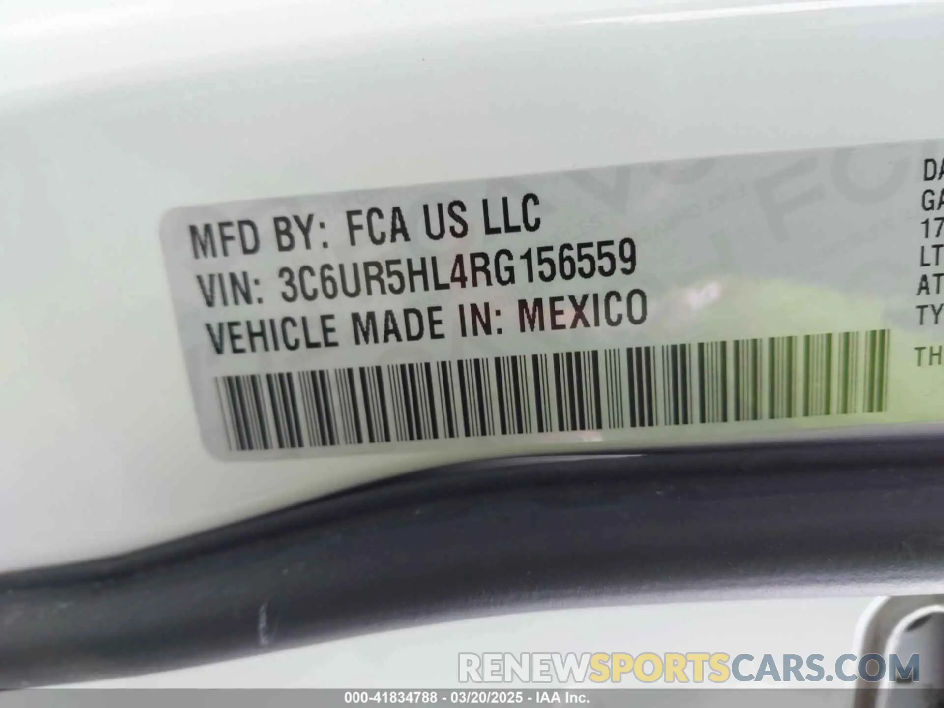 9 Photograph of a damaged car 3C6UR5HL4RG156559 RAM 2500 2024