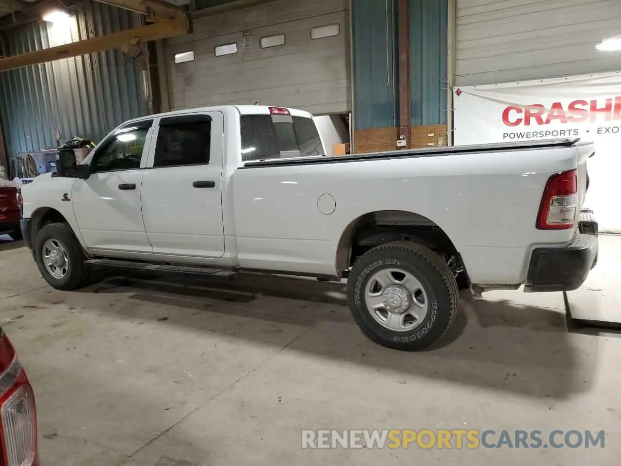 2 Photograph of a damaged car 3C6UR5HL6RG328526 RAM 2500 2024