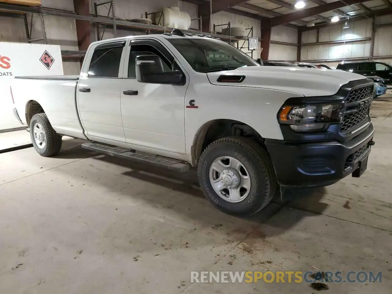 4 Photograph of a damaged car 3C6UR5HL6RG328526 RAM 2500 2024
