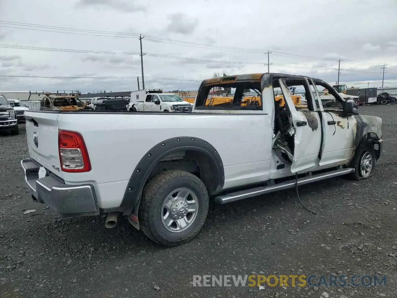 3 Photograph of a damaged car 3C6UR5HL8RG172389 RAM 2500 2024