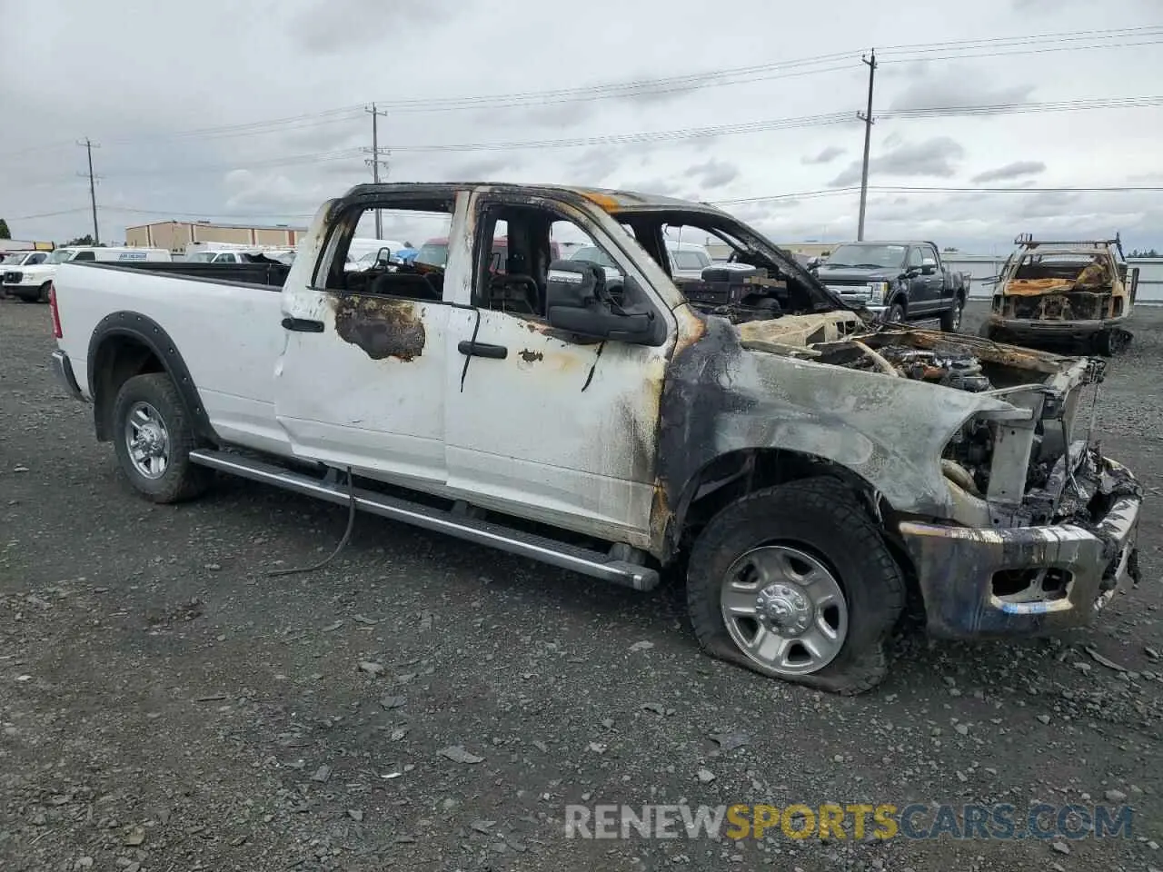 4 Photograph of a damaged car 3C6UR5HL8RG172389 RAM 2500 2024