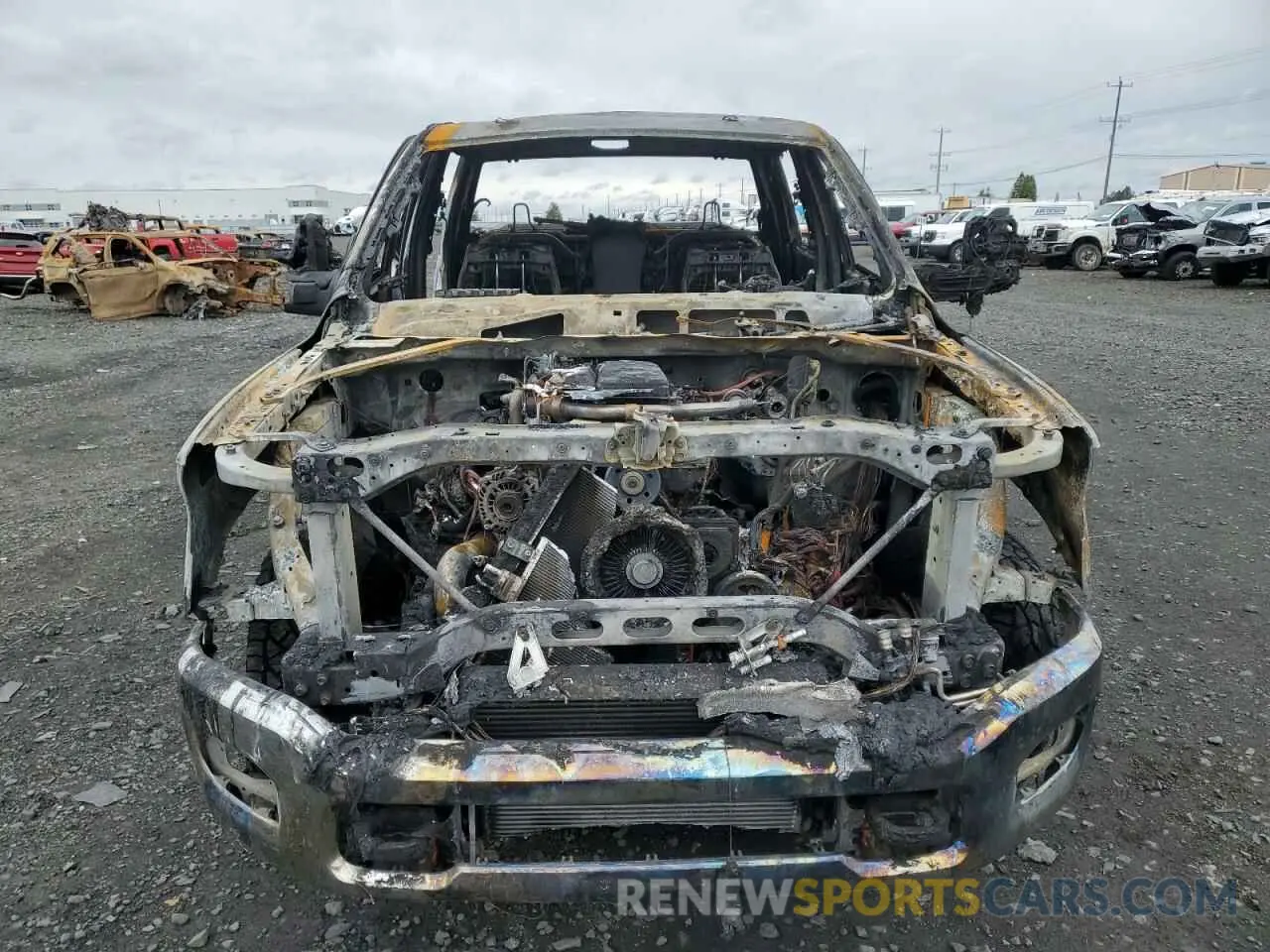 5 Photograph of a damaged car 3C6UR5HL8RG172389 RAM 2500 2024