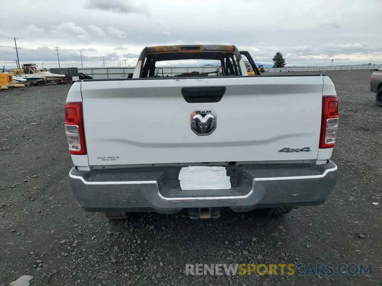6 Photograph of a damaged car 3C6UR5HL8RG172389 RAM 2500 2024