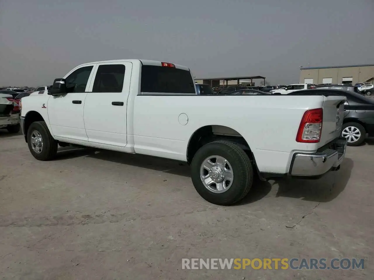 2 Photograph of a damaged car 3C6UR5HL8RG395452 RAM 2500 2024