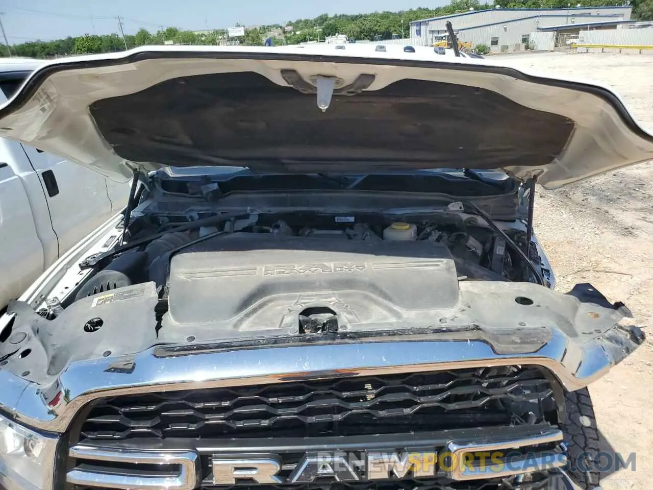 11 Photograph of a damaged car 3C6UR5HL9RG141202 RAM 2500 2024
