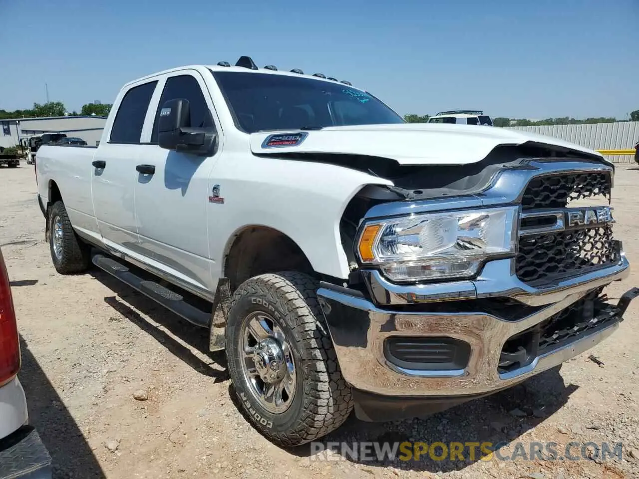 4 Photograph of a damaged car 3C6UR5HL9RG141202 RAM 2500 2024
