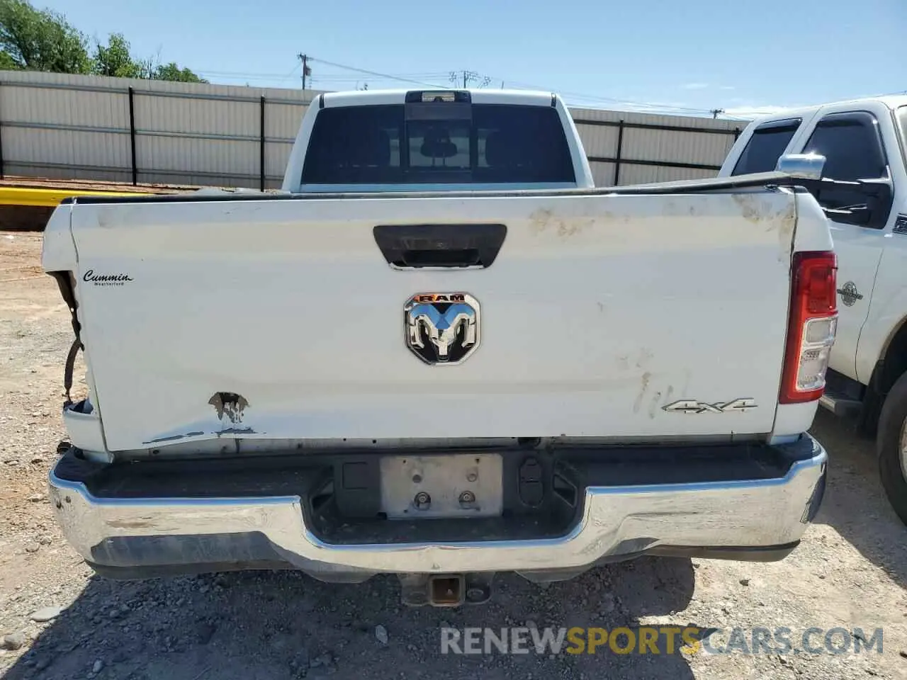 6 Photograph of a damaged car 3C6UR5HL9RG141202 RAM 2500 2024