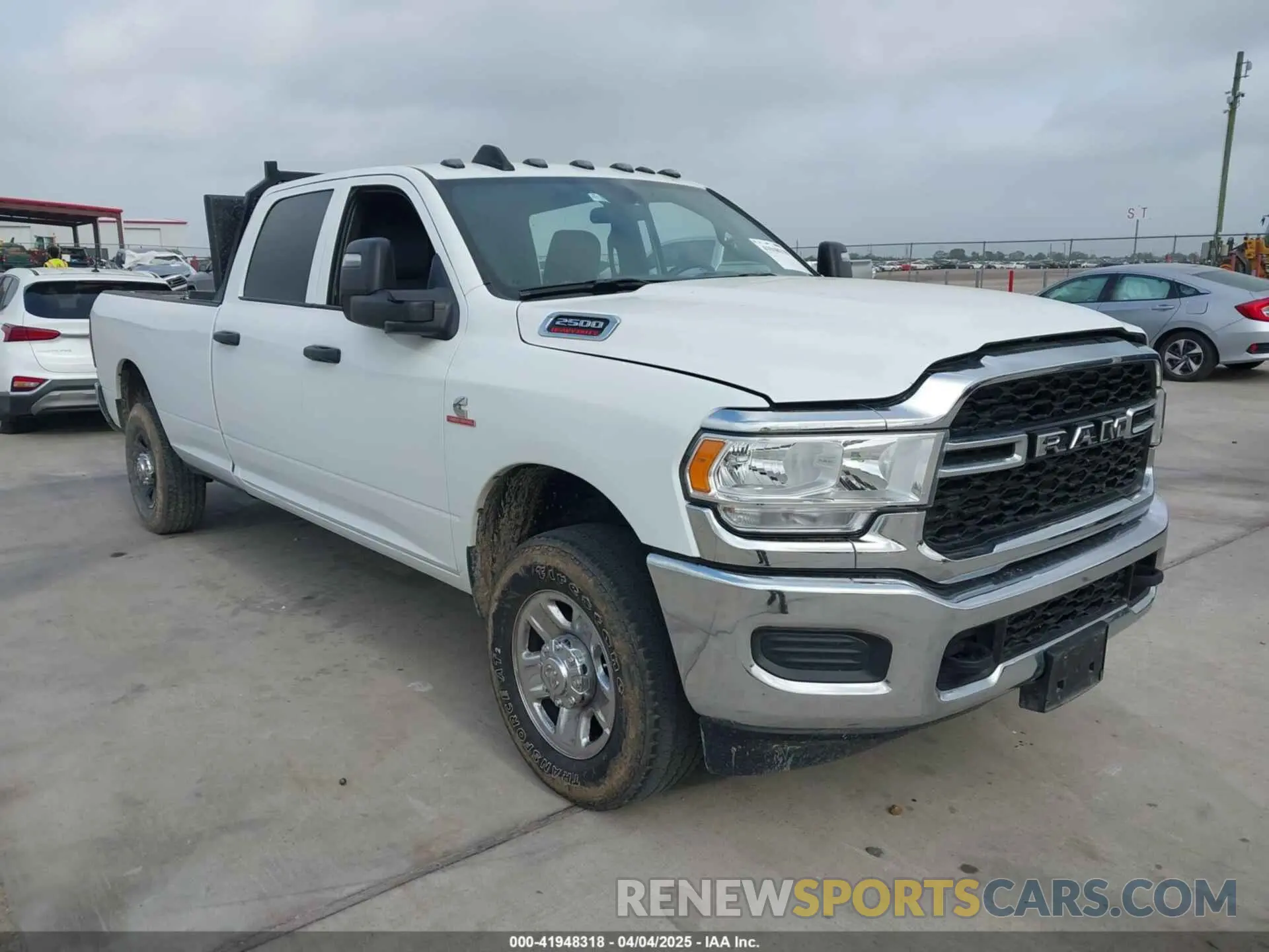 1 Photograph of a damaged car 3C6UR5HL9RG218229 RAM 2500 2024