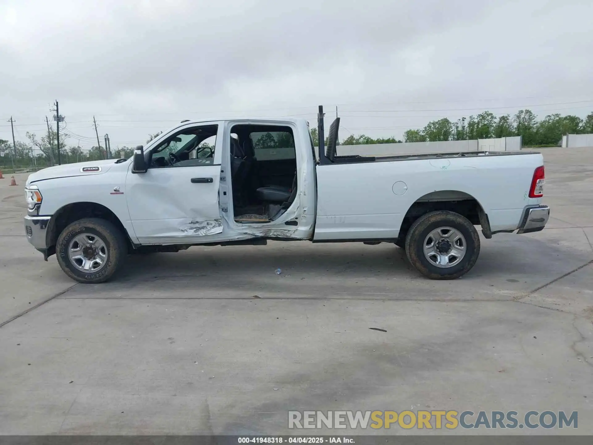 14 Photograph of a damaged car 3C6UR5HL9RG218229 RAM 2500 2024
