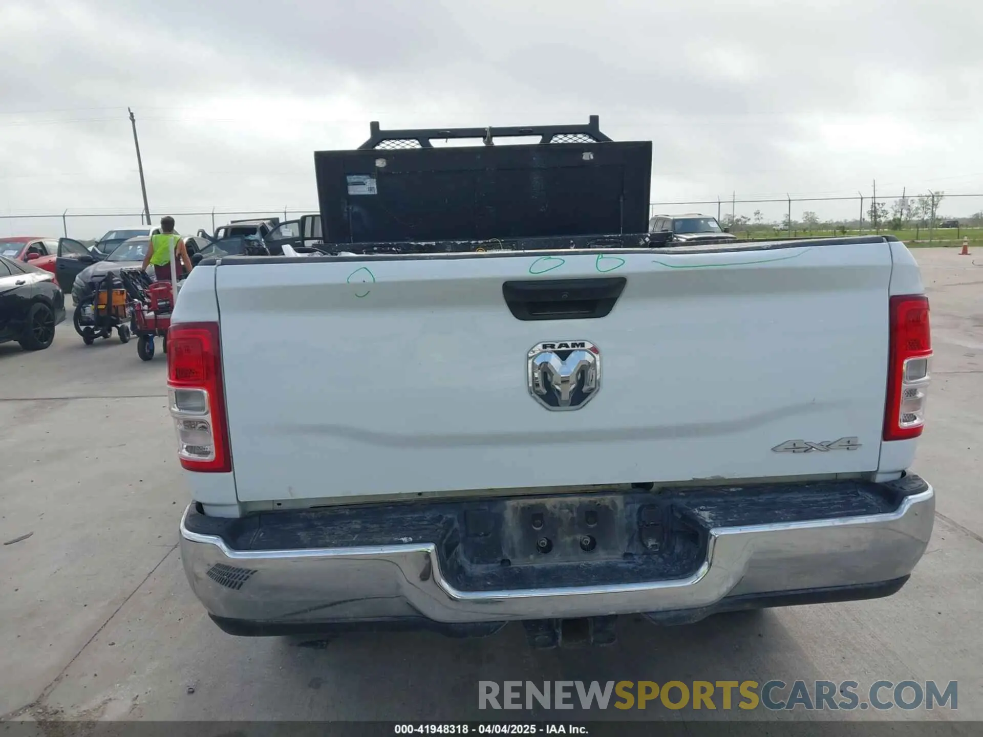 16 Photograph of a damaged car 3C6UR5HL9RG218229 RAM 2500 2024