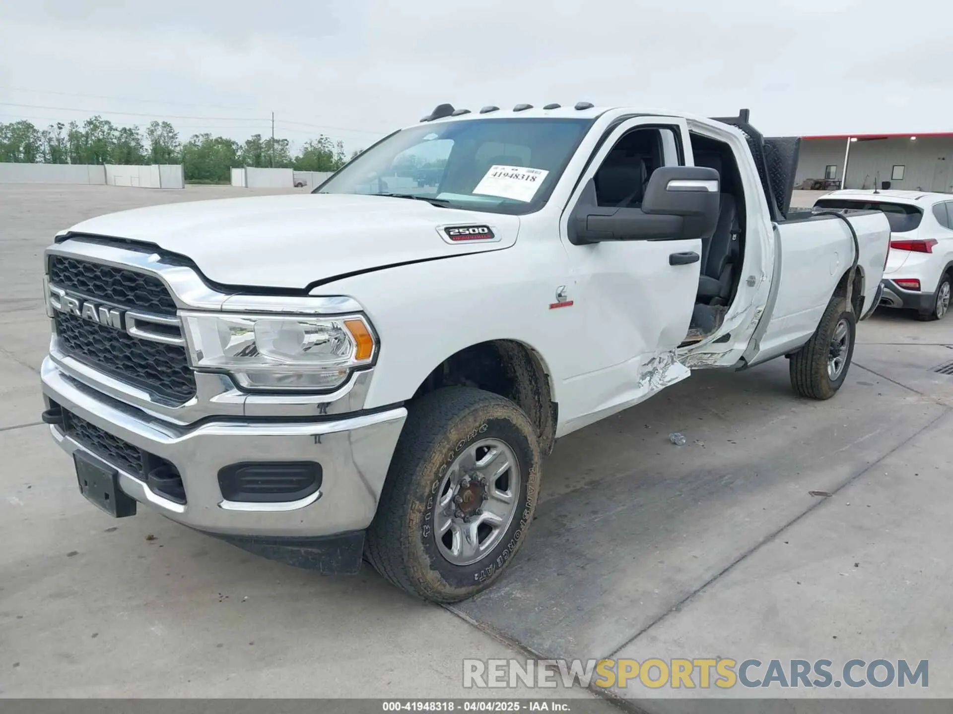 2 Photograph of a damaged car 3C6UR5HL9RG218229 RAM 2500 2024