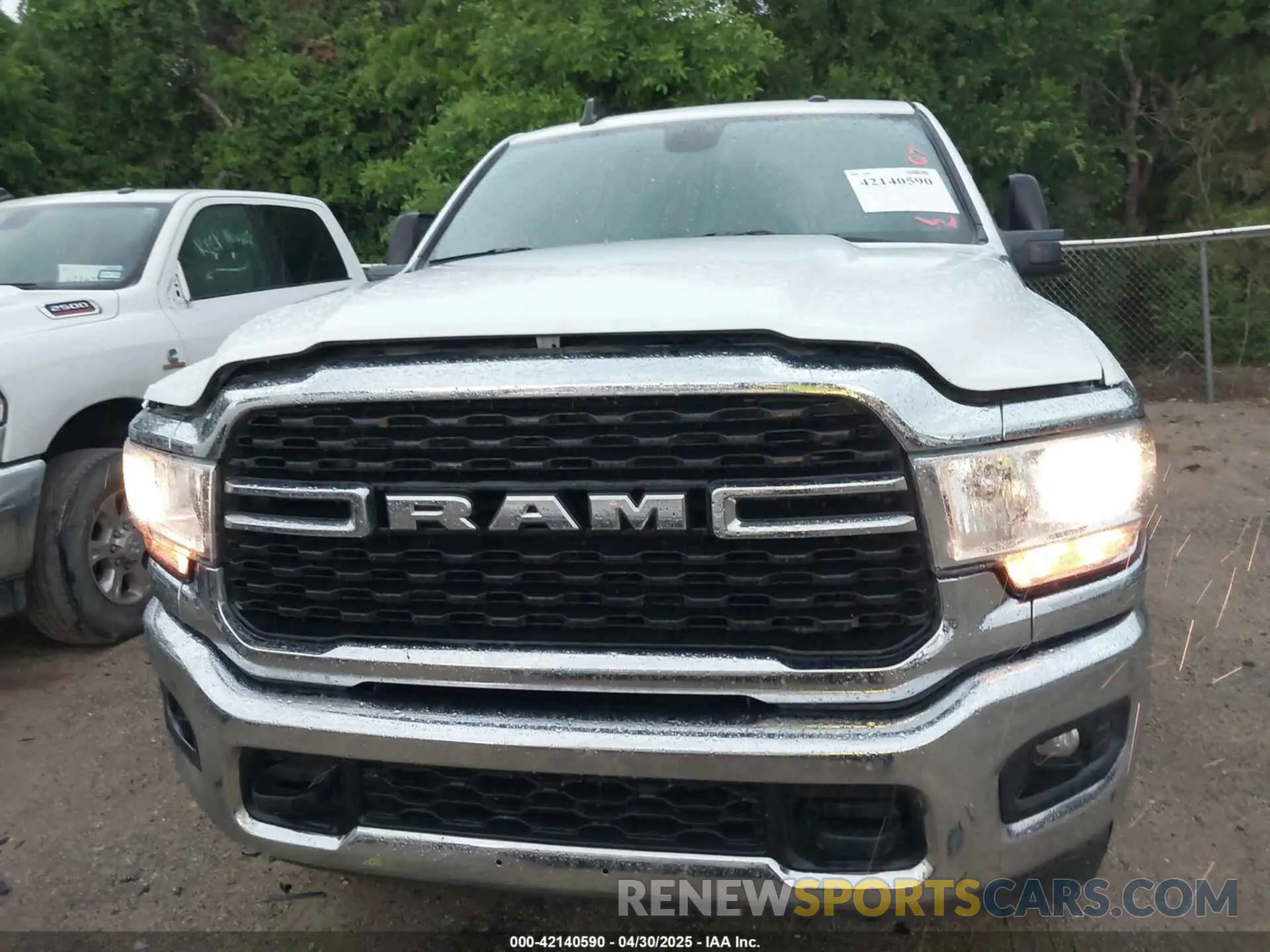 12 Photograph of a damaged car 3C6UR5JL5RG337647 RAM 2500 2024