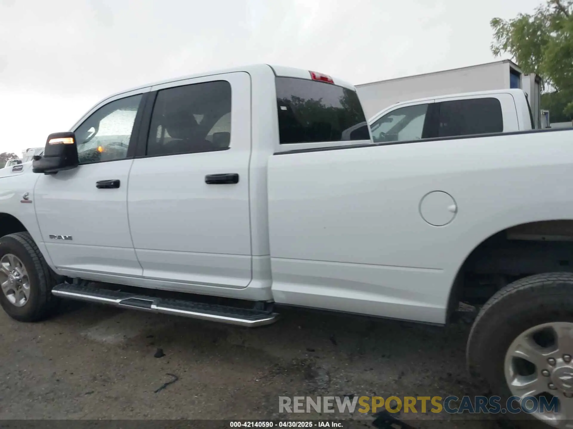 14 Photograph of a damaged car 3C6UR5JL5RG337647 RAM 2500 2024