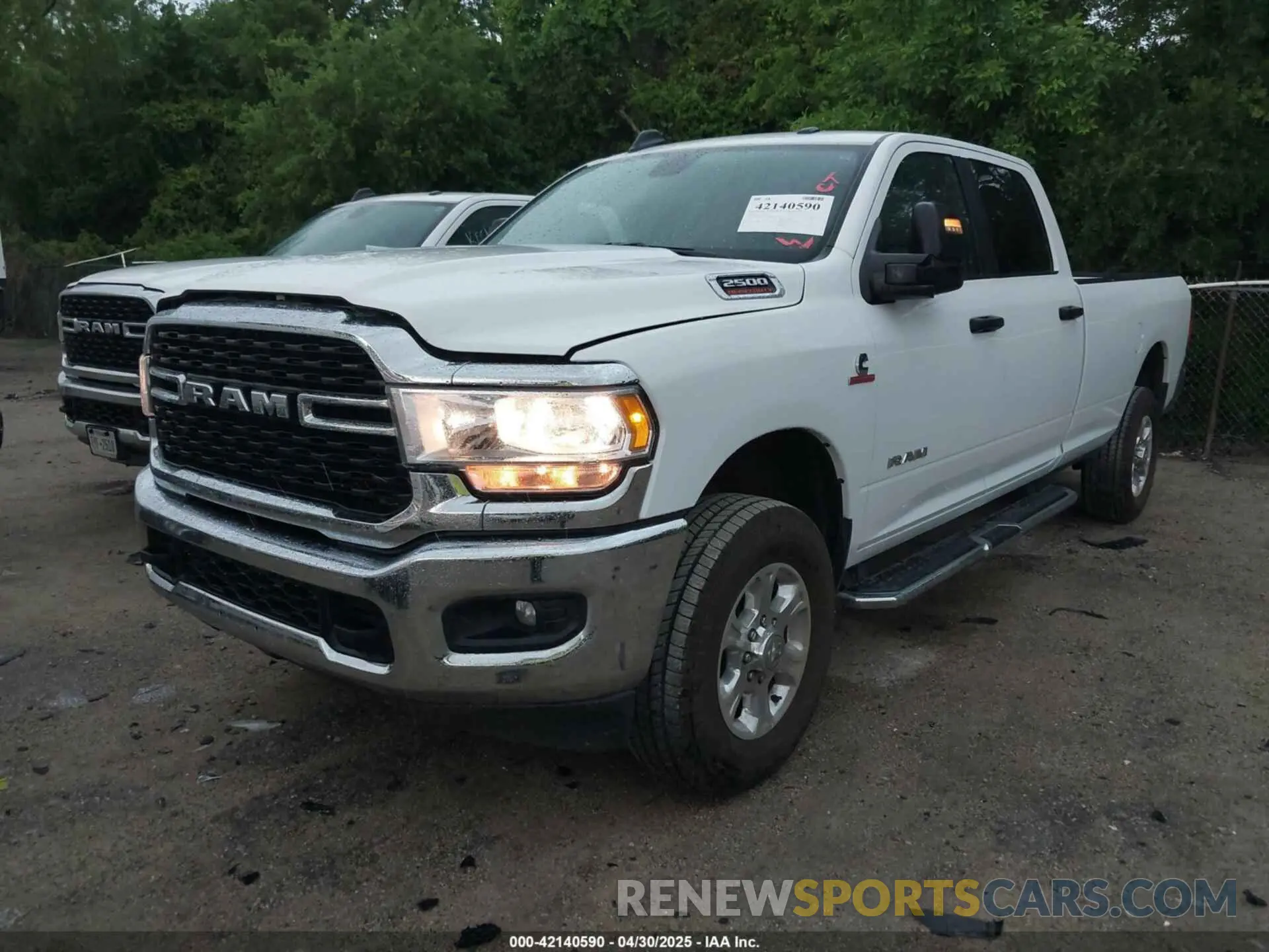 2 Photograph of a damaged car 3C6UR5JL5RG337647 RAM 2500 2024