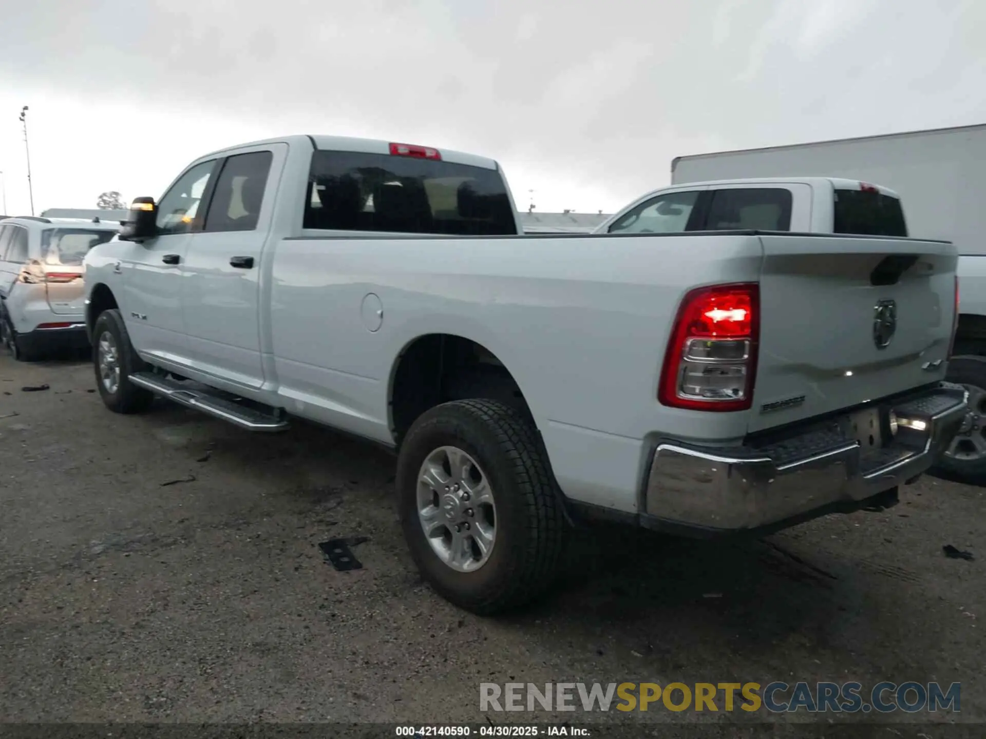 3 Photograph of a damaged car 3C6UR5JL5RG337647 RAM 2500 2024
