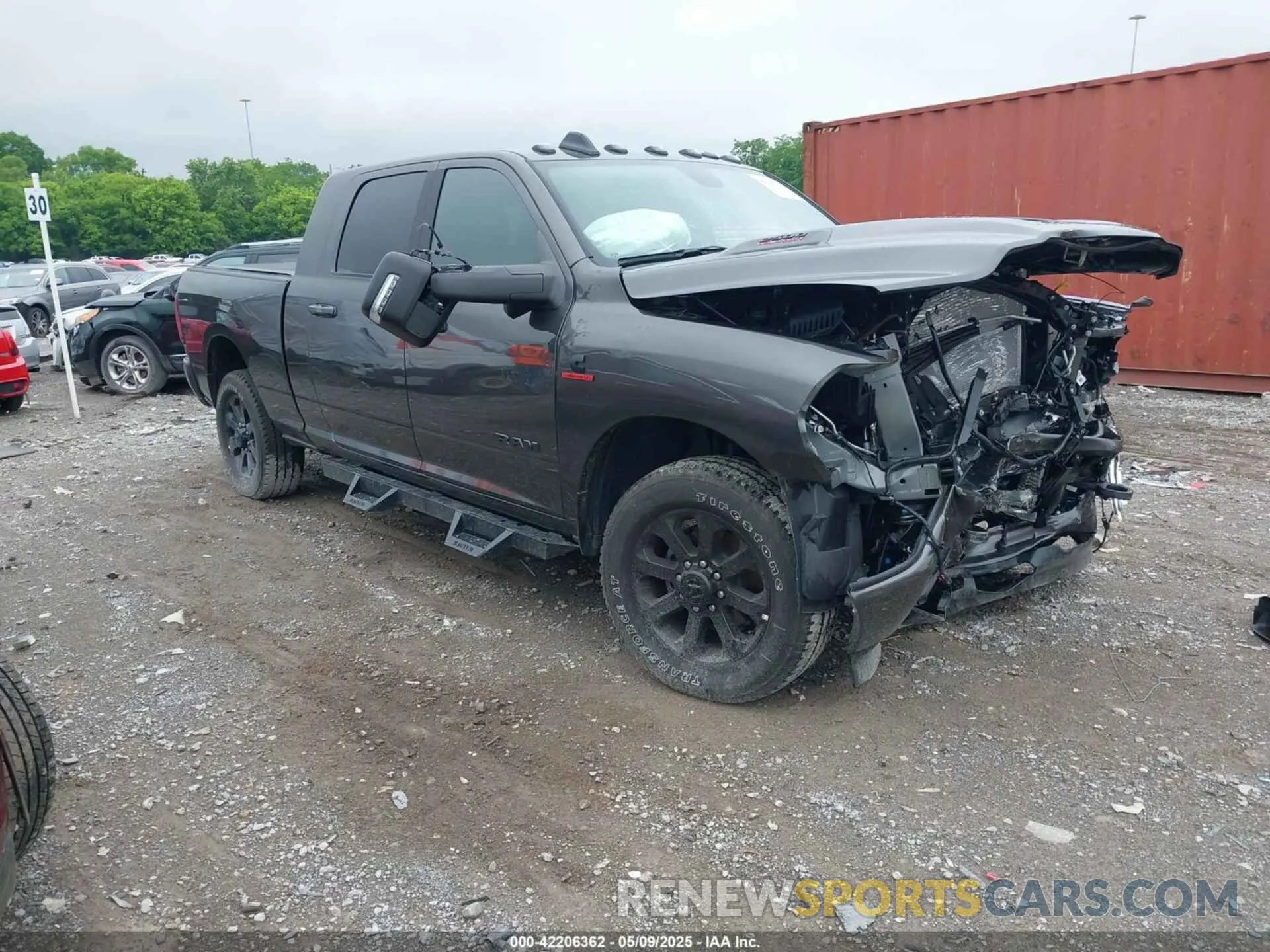 1 Photograph of a damaged car 3C6UR5NL0RG329918 RAM 2500 2024