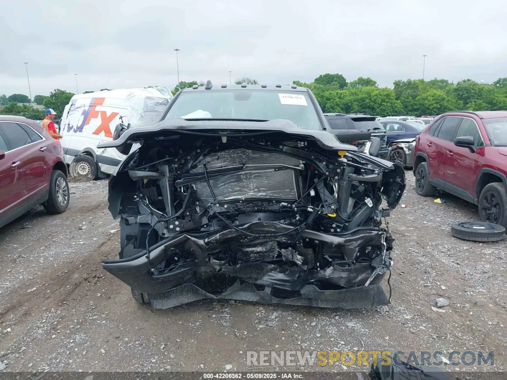 13 Photograph of a damaged car 3C6UR5NL0RG329918 RAM 2500 2024