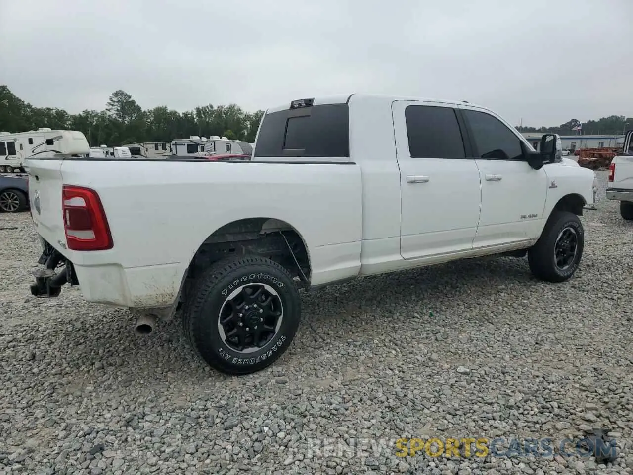 3 Photograph of a damaged car 3C6UR5NL4RG377891 RAM 2500 2024
