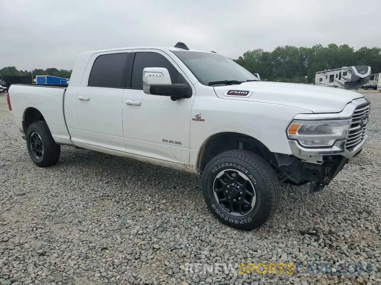 4 Photograph of a damaged car 3C6UR5NL4RG377891 RAM 2500 2024