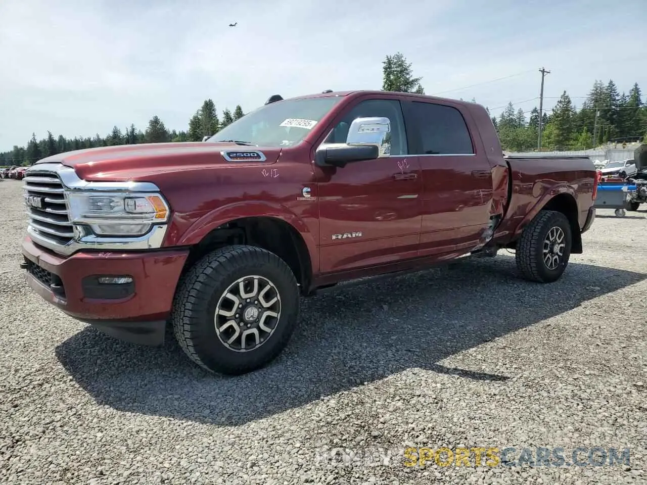 1 Photograph of a damaged car 3C6UR5PL2RG383945 RAM 2500 2024