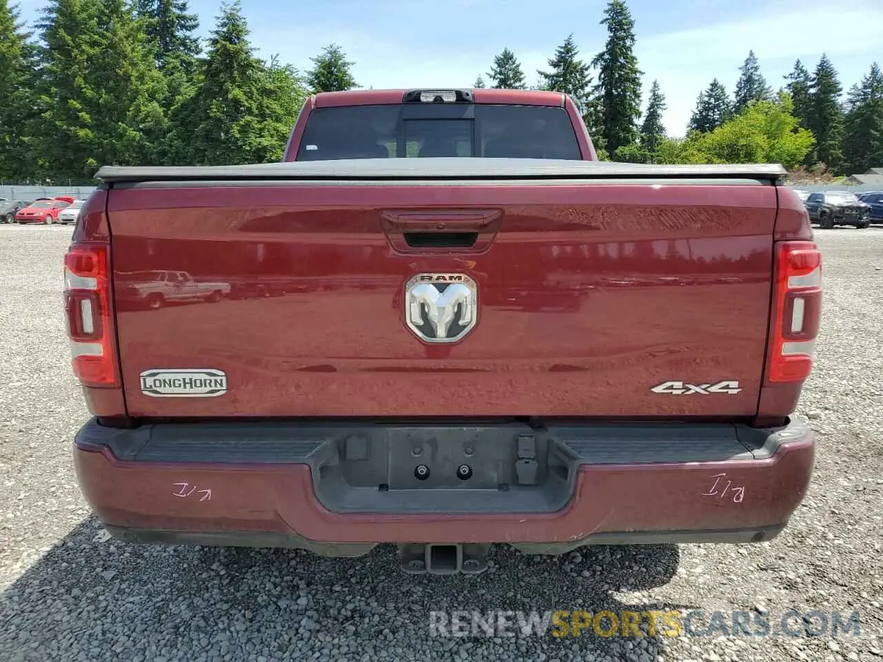6 Photograph of a damaged car 3C6UR5PL2RG383945 RAM 2500 2024