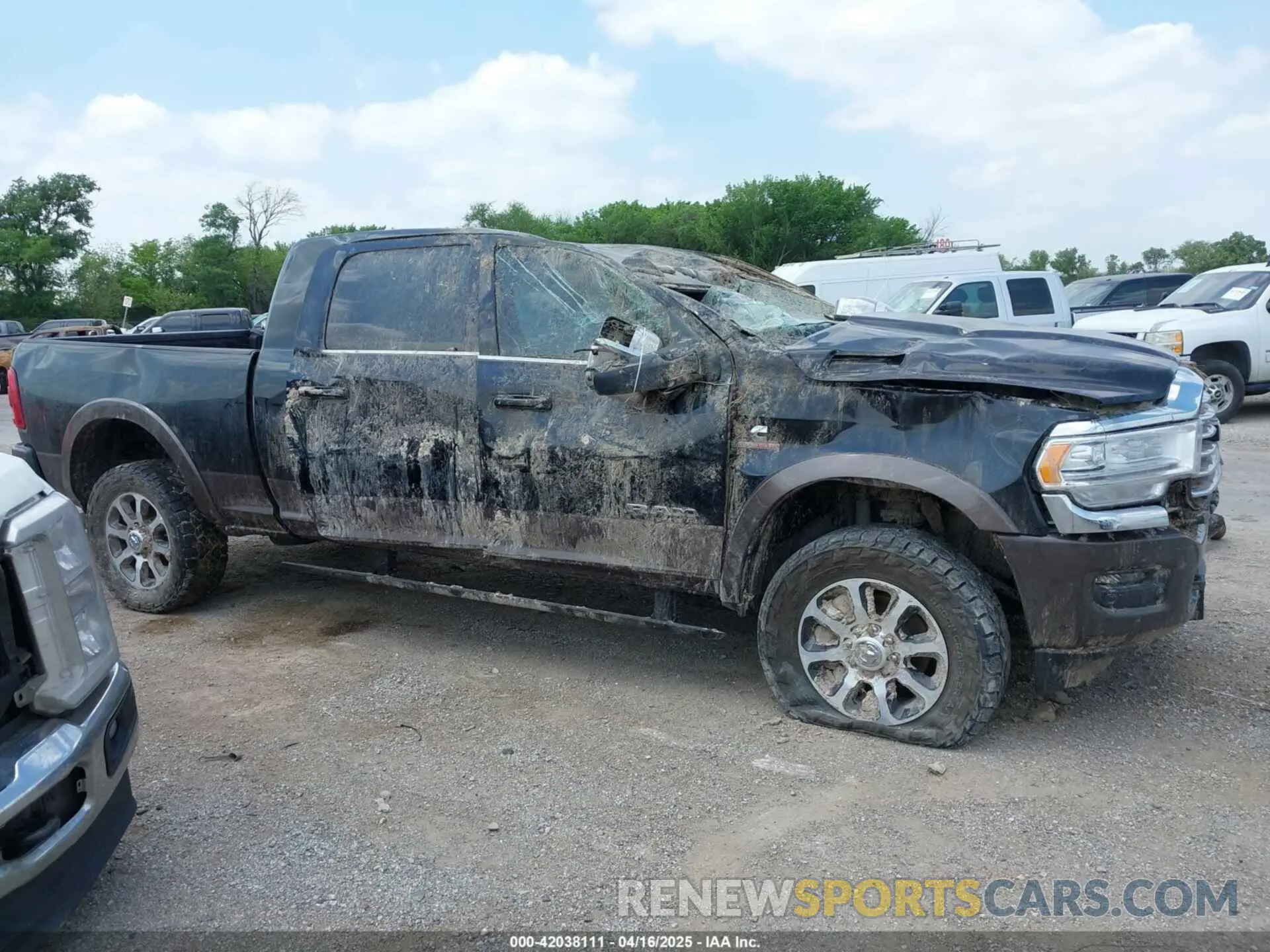 13 Photograph of a damaged car 3C6UR5PL9RG187016 RAM 2500 2024